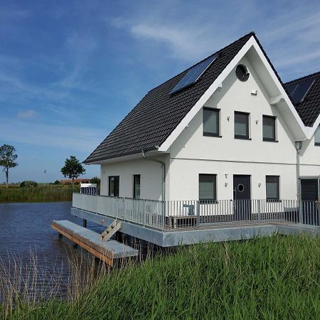 Nr 110 - Ferienhaus Seeperle Pfahlhaus Auf Der Harle Carolinensiel Luaran gambar